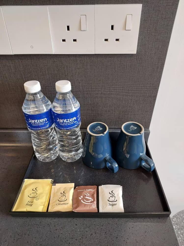 Millerz Square By Mykey Lägenhet Kuala Lumpur Exteriör bild Bottled water in a hotel room