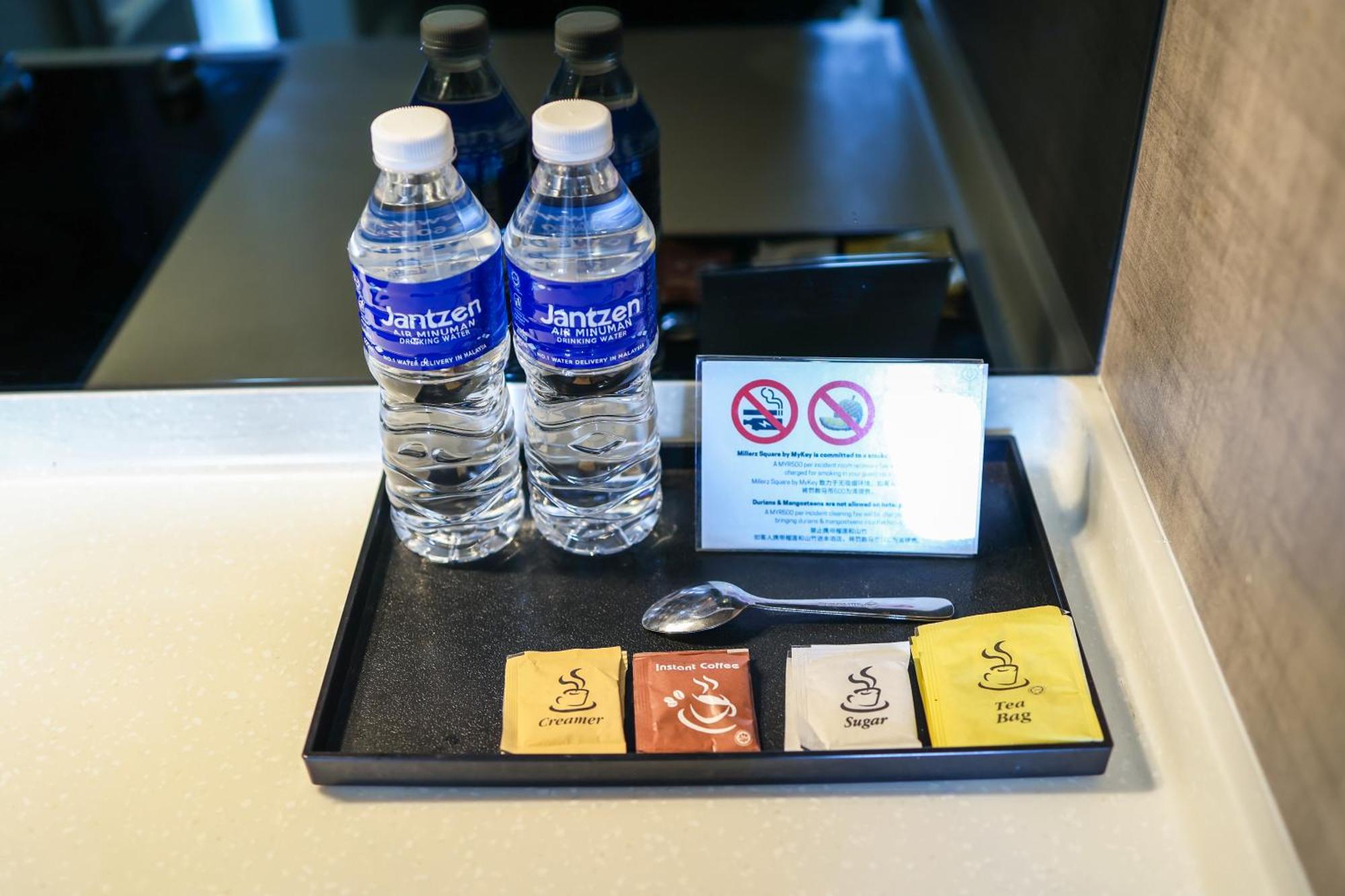 Millerz Square By Mykey Lägenhet Kuala Lumpur Exteriör bild Bottled water and tea bags in a hotel room